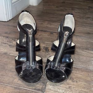 Patent leather black zip Michael Kors Sandal heels -size 7. Worn once indoors.